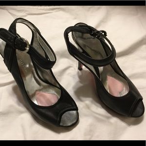 Paris Hilton black heels.